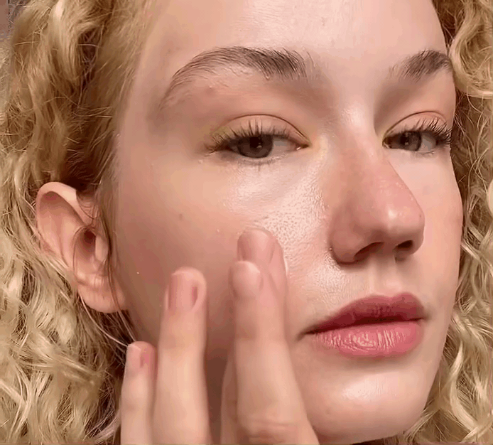 Gif showing the Vegan Sun Cream being applied on the skin.